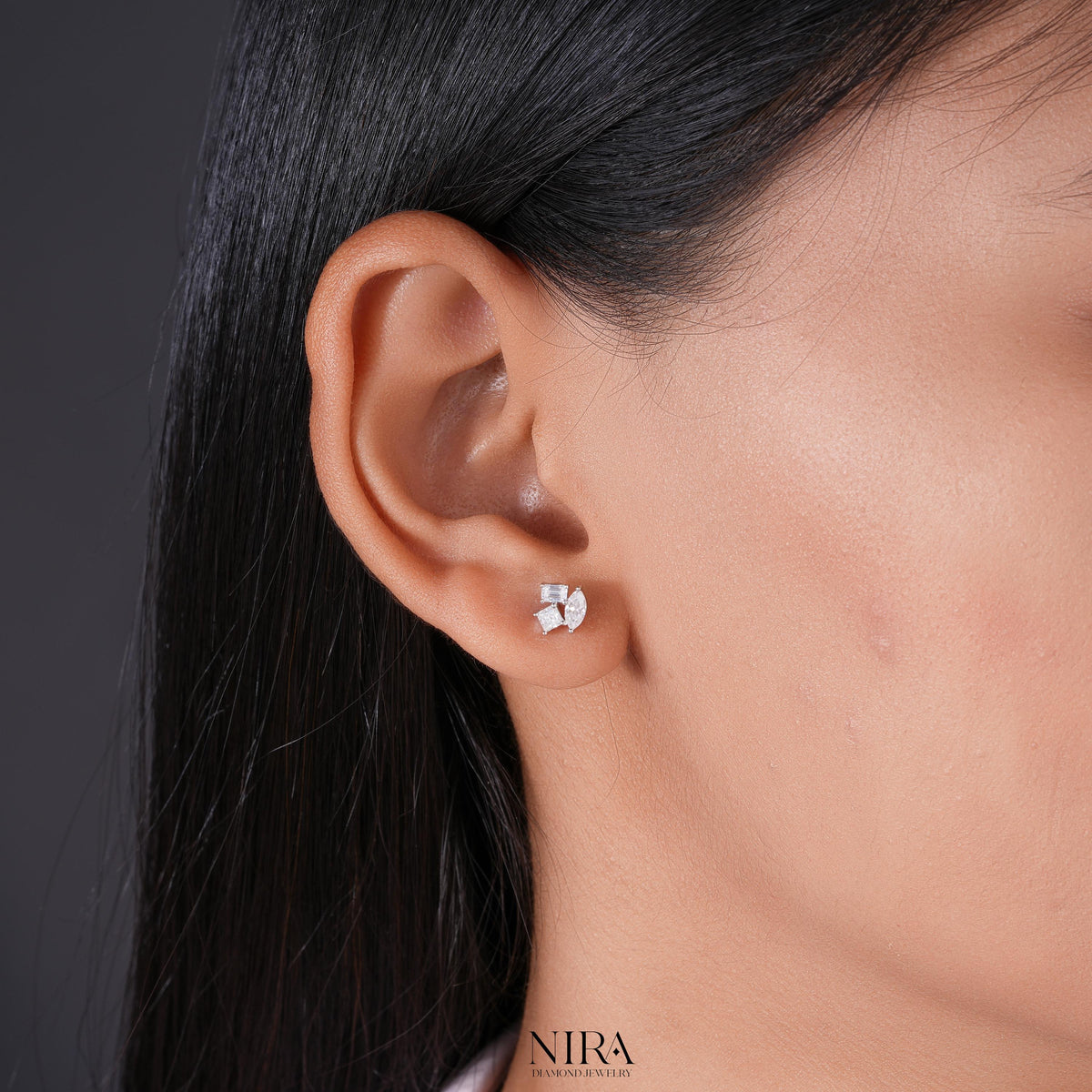 Marquise & Emerald Cut Moissanite Cluster Stud Earrings | 925 Silver or Solid Gold - Top-Down Macro Shot | NIRA Diamond Jewelry